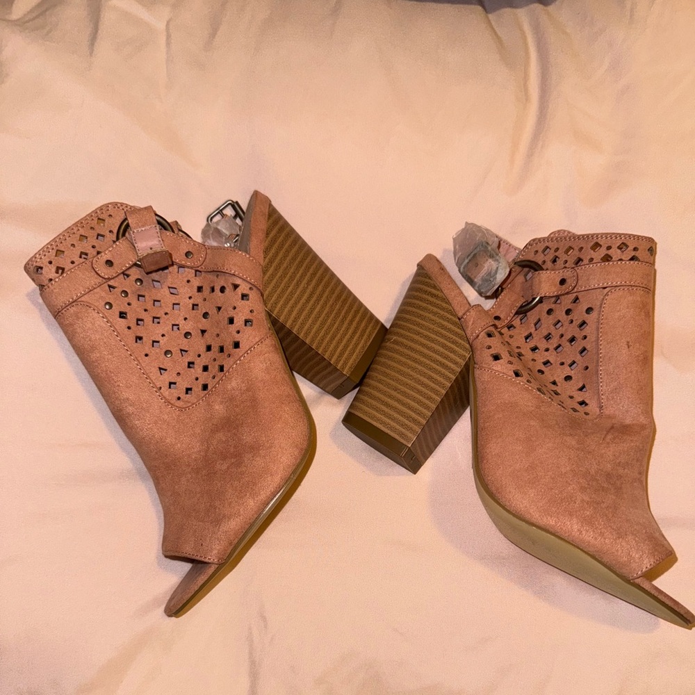 Never worn heels